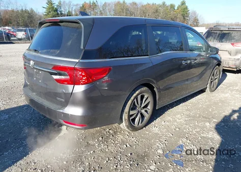 2023 Honda Odyssey Touring z USA, uszkodzony, nr VIN 5FNRL6H87PB032578